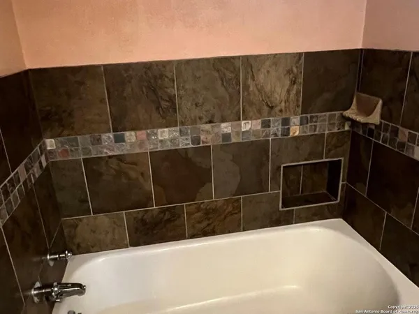 a kitchen with a refrigerator sink and stove