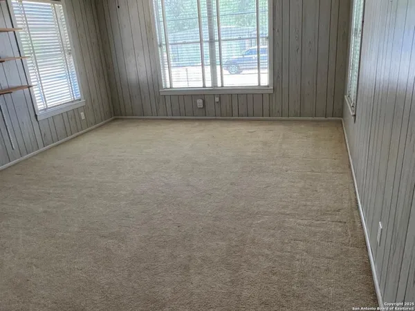 a view of a kitchen with an empty space