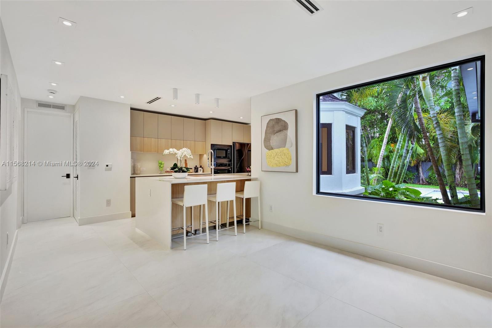 4321 Alton Road Miami Beach, FL 33140 - Photo 16 of 56 a view of a livingroom with furniture window and outside view