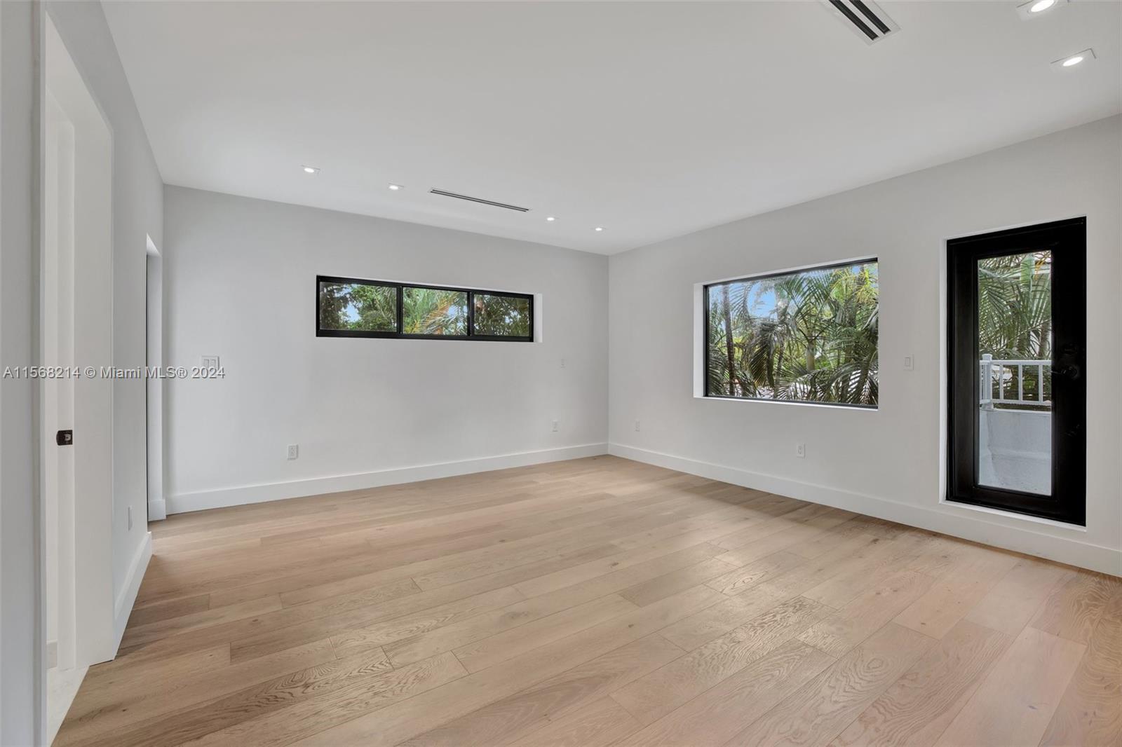 4321 Alton Road Miami Beach, FL 33140 - Photo 33 of 56 a view of an empty room with a window