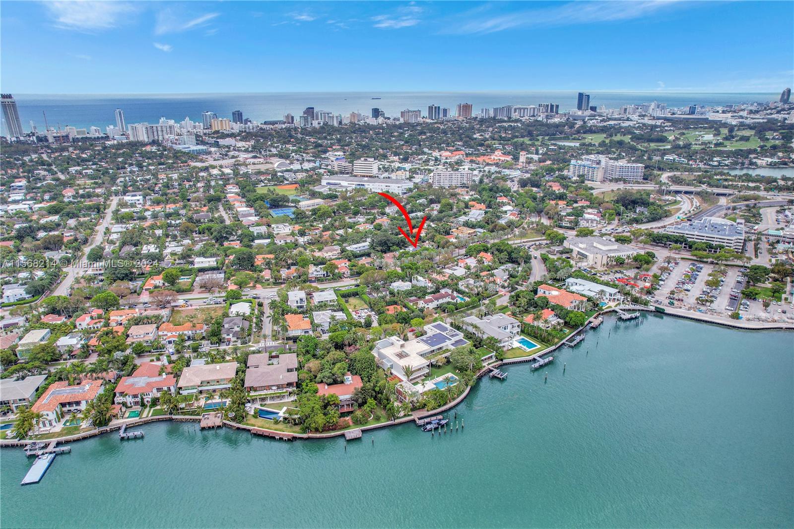 4321 Alton Road Miami Beach, FL 33140 - Photo 53 of 56 an aerial view of a houses with a lake view