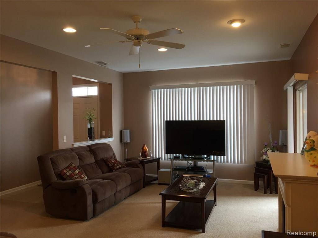 46112 Rhodes Drive Macomb, MI 48044 - Photo 4 of 20 living room.jpg