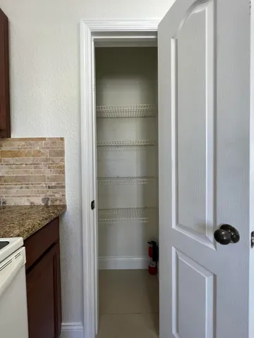 a view of a livingroom and entryway