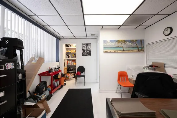 a view of a workspace with furniture