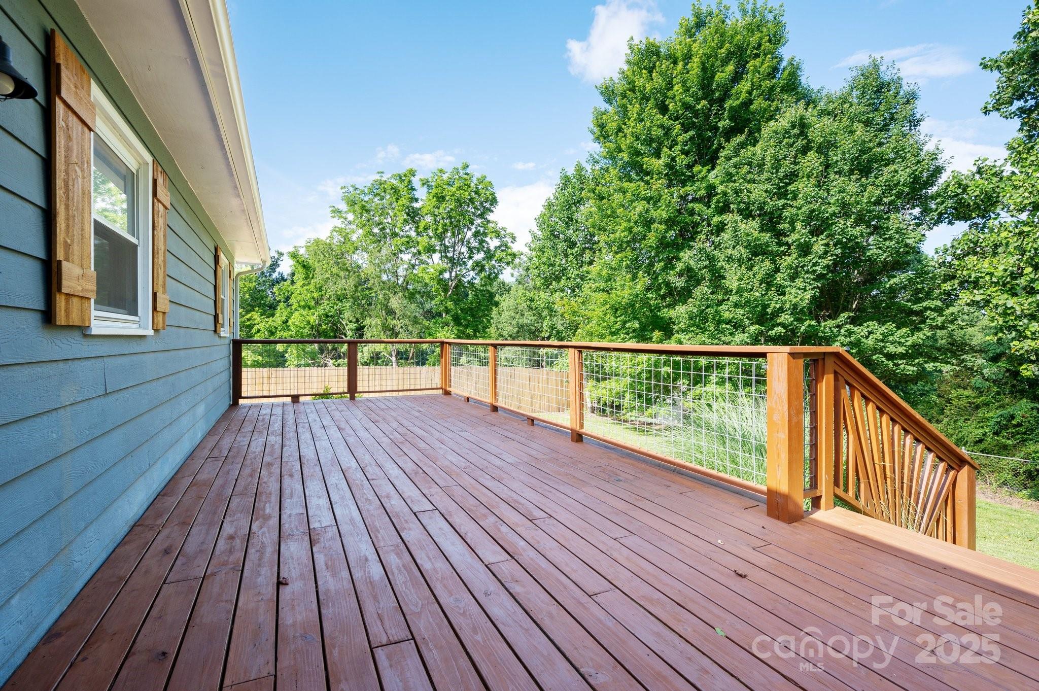 28 Spaulding Road Candler, NC 28715 - Photo 24 of 31 a view of deck with wooden floor and fence