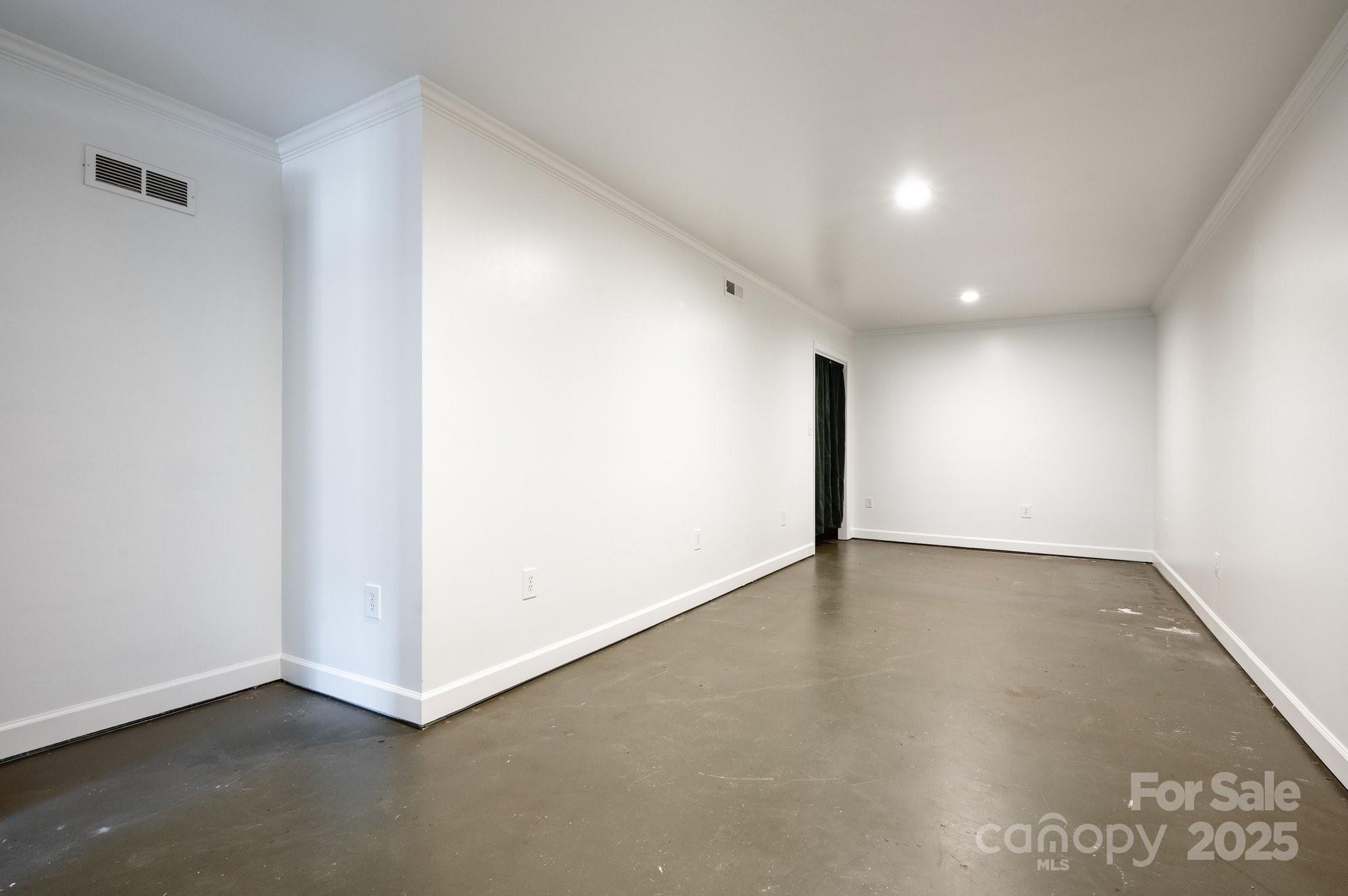 28 Spaulding Road Candler, NC 28715 - Photo 27 of 31 an empty room with a empty space and window