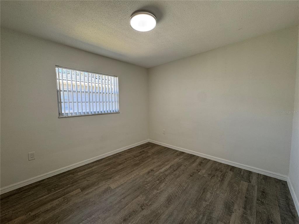 629 Rugby Street Orlando, FL 32804 - Photo 16 of 19 an empty room with a window