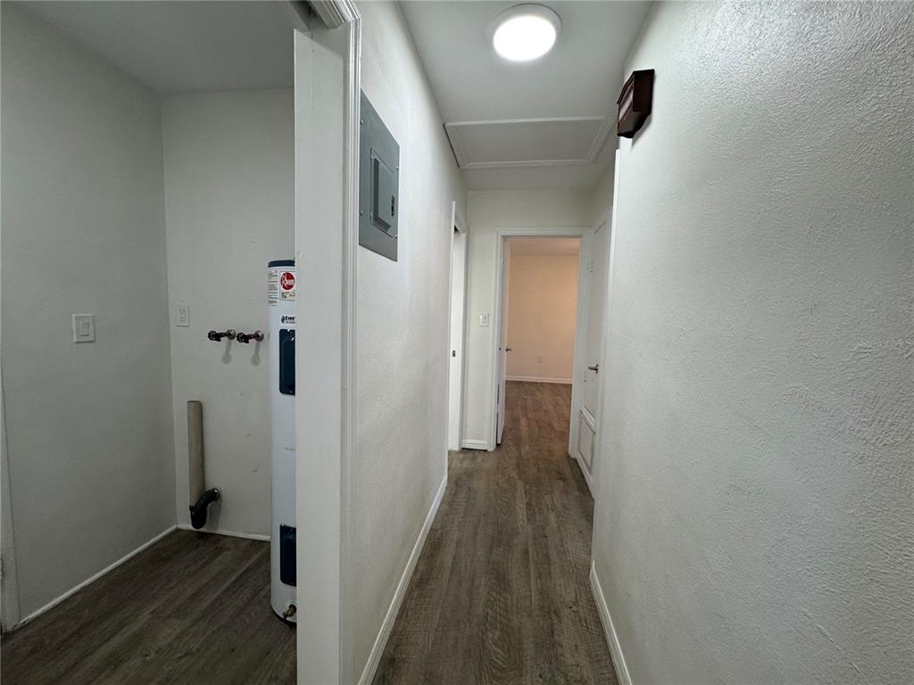 629 Rugby Street Orlando, FL 32804 - Photo 8 of 19 a view of a bathroom with wooden floor