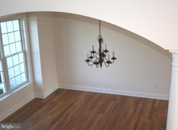21363 Island Club Road Tilghman, MD 21671 - Photo 11 of 17 Dining Room with custom archway entrance.