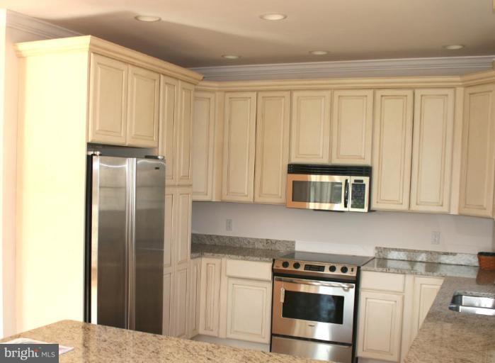 21363 Island Club Road Tilghman, MD 21671 - Photo 10 of 17 Large Kitchen with Granite and custom cabinetry