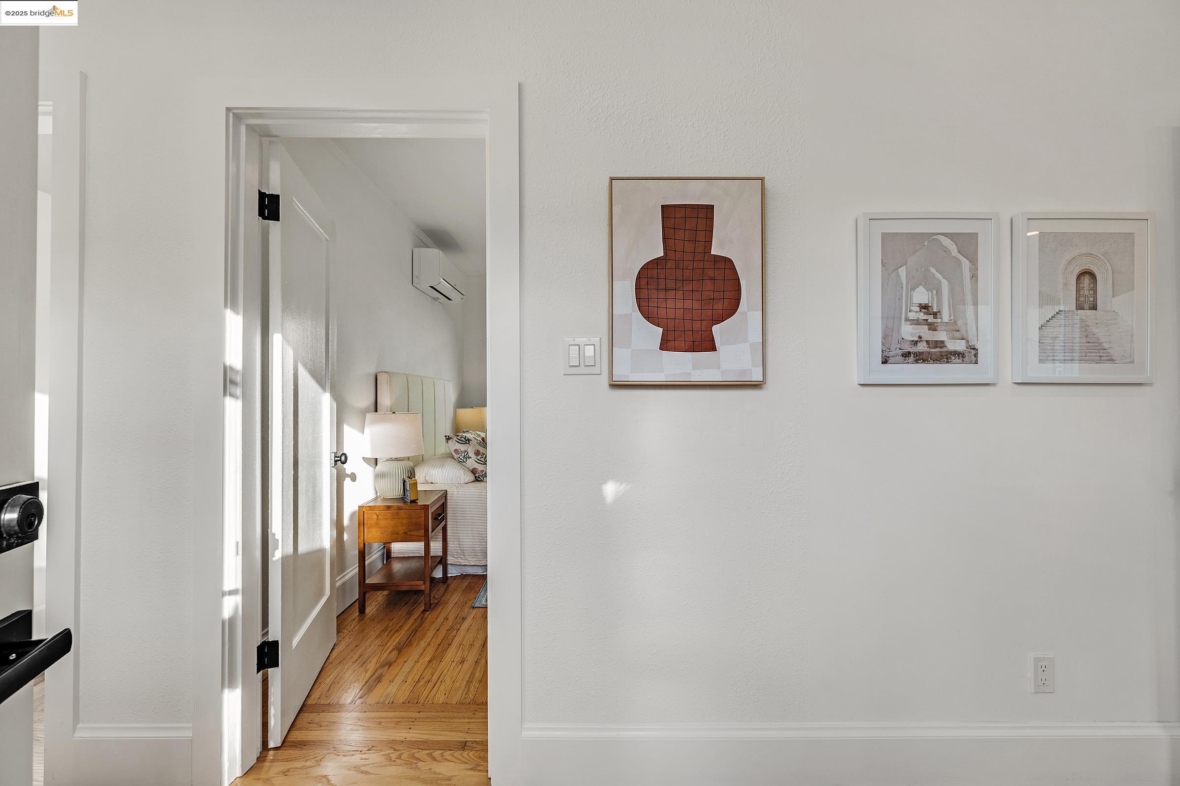 1515 Derby Street Berkeley, CA 94703 - Photo 35 of 60 a view of a hallway with a livingroom and a dinning area with chandelier