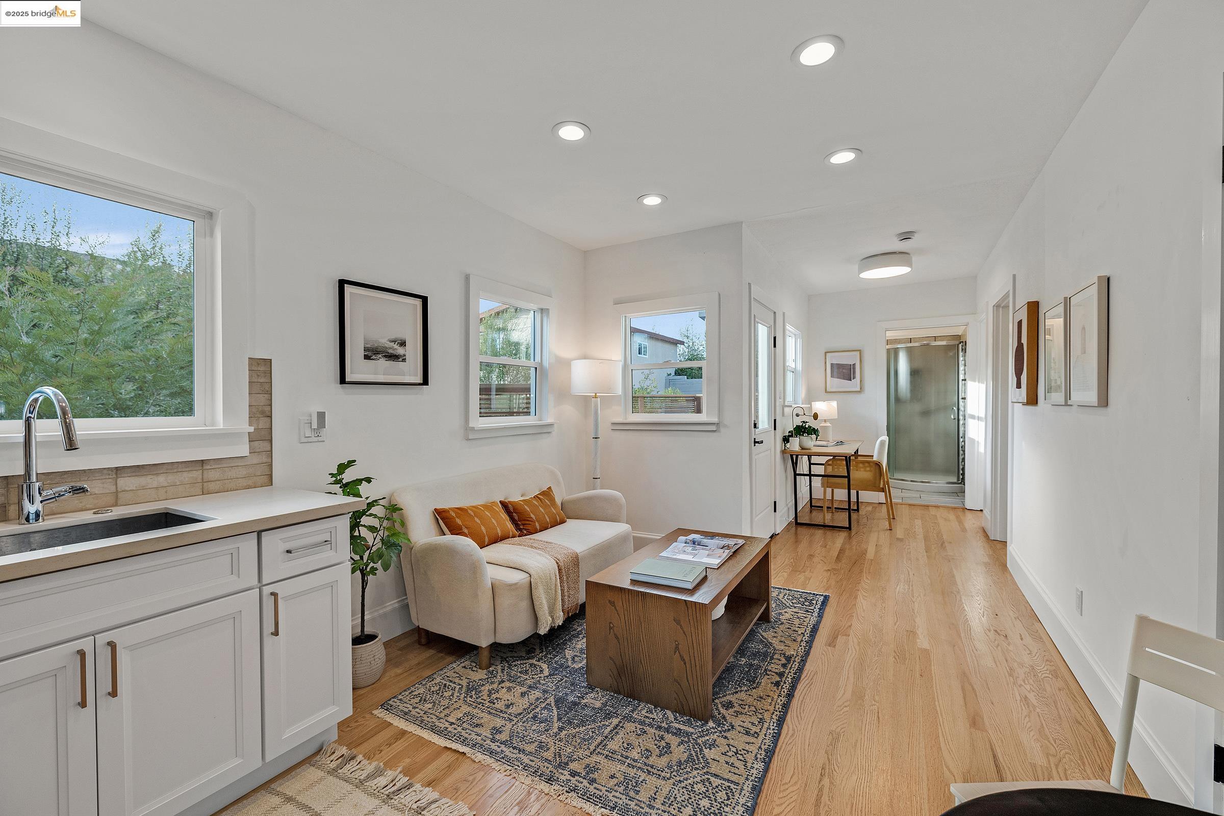 1515 Derby Street Berkeley, CA 94703 - Photo 44 of 60 Living room with light wood-style floors and recessed lighting