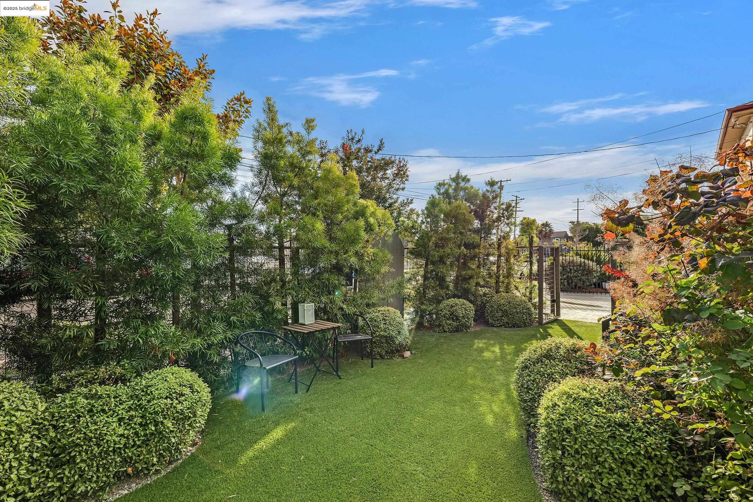1515 Derby Street Berkeley, CA 94703 - Photo 5 of 60 View of green lawn with a gate