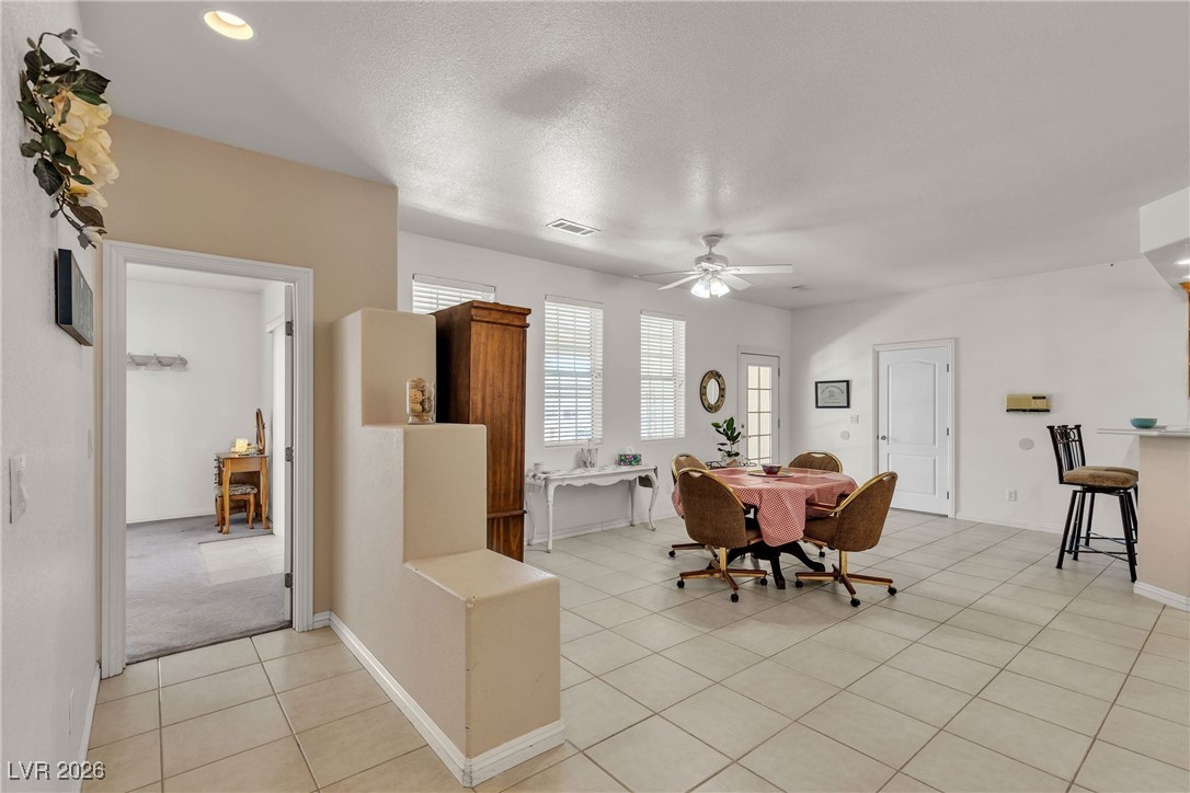 825 West Ryan Avenue Overton, NV 89040 - Photo 27 of 88 Dining room featuring light tile patterned floors and ceiling fan