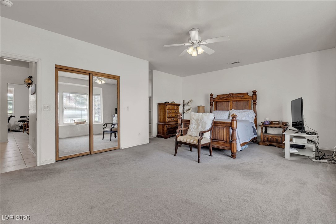 825 West Ryan Avenue Overton, NV 89040 - Photo 29 of 88 Carpeted bedroom featuring a ceiling fan