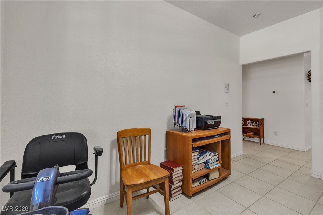825 West Ryan Avenue Overton, NV 89040 - Photo 35 of 88 Living area featuring light tile patterned flooring and baseboards