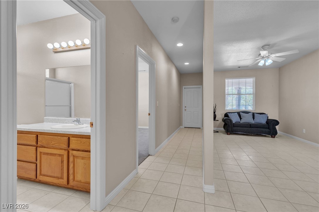 825 West Ryan Avenue Overton, NV 89040 - Photo 61 of 88 Hall with light tile patterned floors and recessed lighting