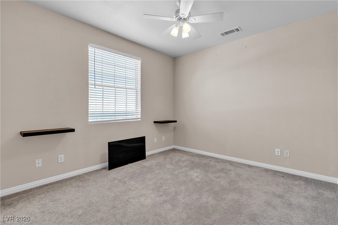 825 West Ryan Avenue Overton, NV 89040 - Photo 63 of 88 Unfurnished room featuring carpet floors and ceiling fan