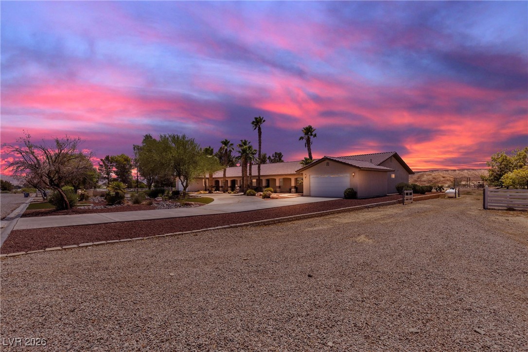 825 West Ryan Avenue Overton, NV 89040 - Photo 7 of 88 Ranch-style home with driveway and a garage
