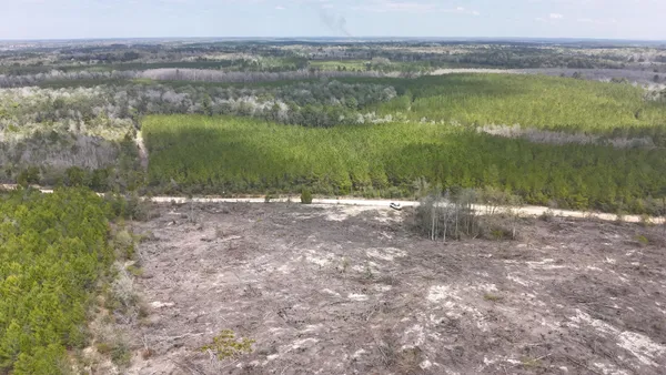 a view of lake with green space