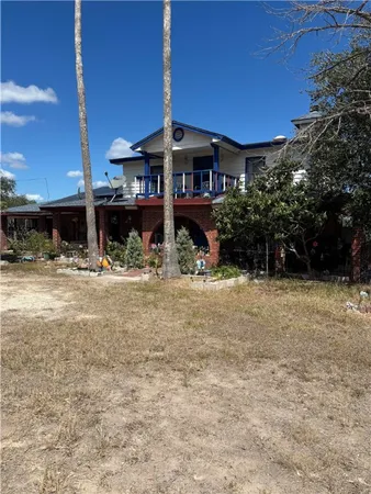 a view of a cafe with sitting area