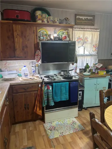 a room with fireplace and flat screen tv