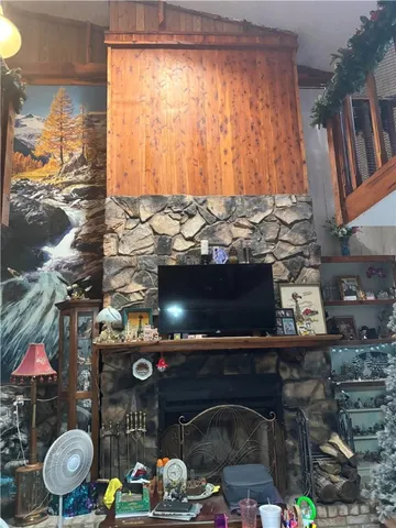 a balcony with a table and chairs