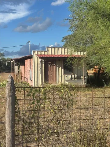 a view of a house with a patio