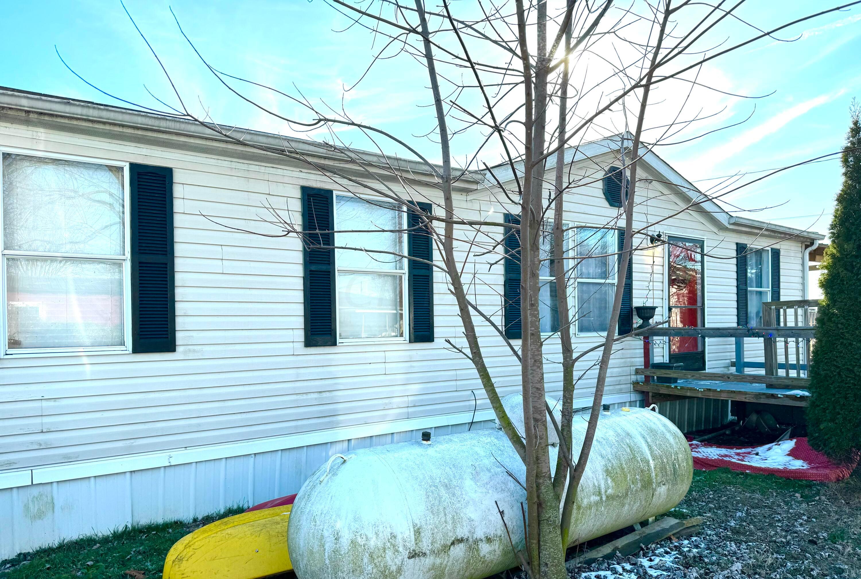 709 South Broadway Street Racine, OH 45771 - Photo 24 of 27 Entrance side of home