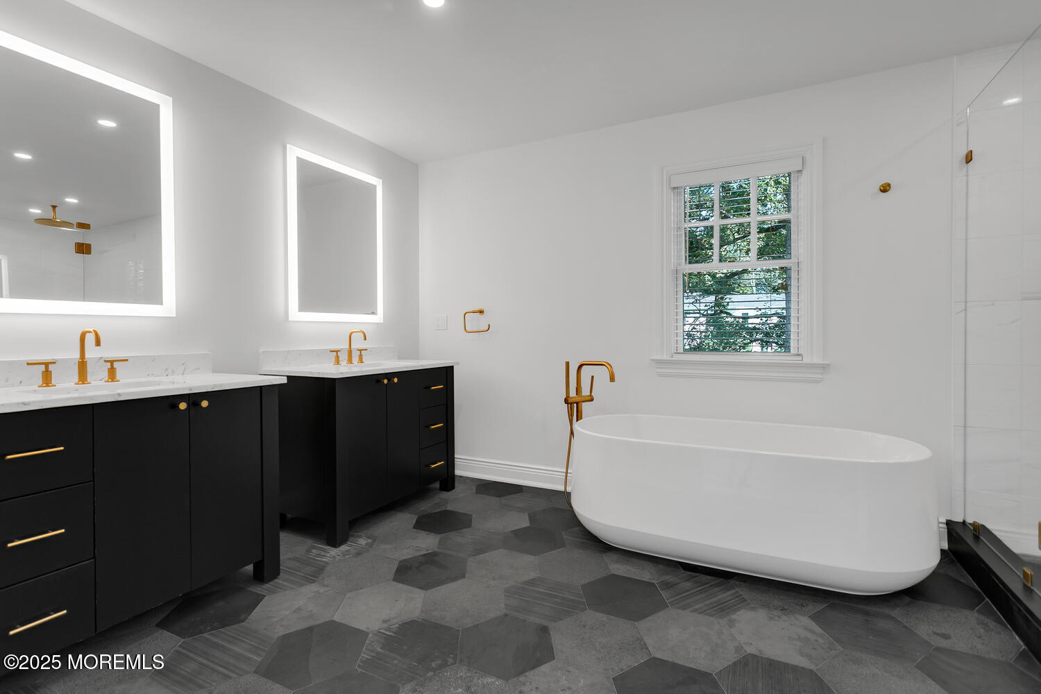 10 Edgewood Road Rumson, NJ 07760 - Photo 14 of 43 a bathroom with a bathtub sink and a window