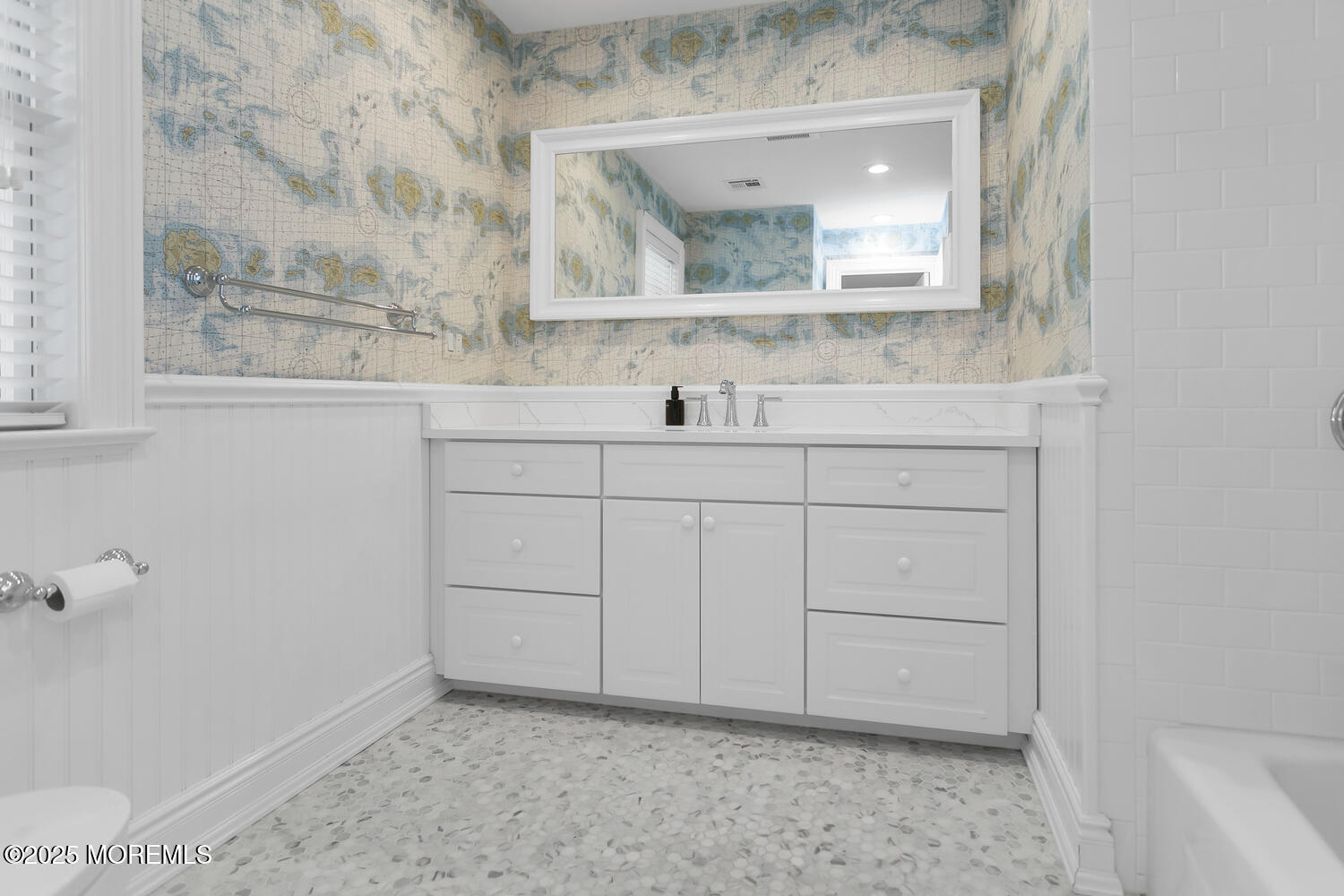 10 Edgewood Road Rumson, NJ 07760 - Photo 20 of 43 a bathroom with a sink and mirror