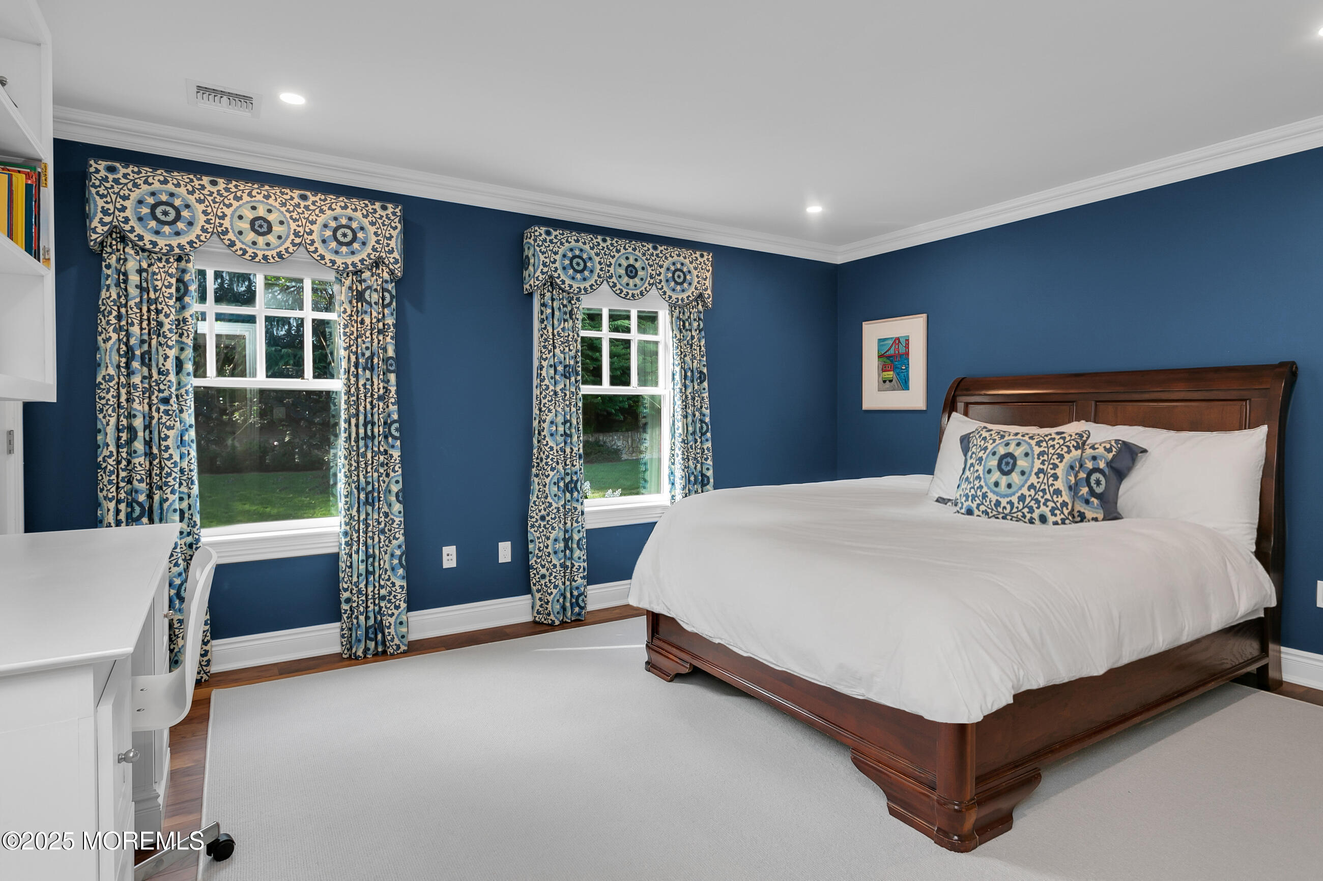 10 Edgewood Road Rumson, NJ 07760 - Photo 21 of 43 a bed sitting in a spacious bedroom next to a window