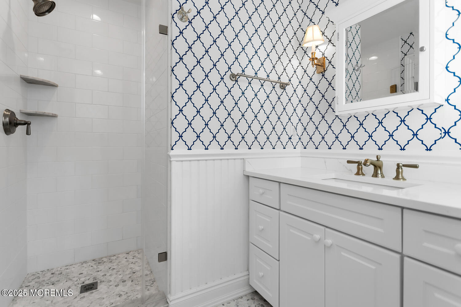 10 Edgewood Road Rumson, NJ 07760 - Photo 23 of 43 a bathroom with a sink and a mirror