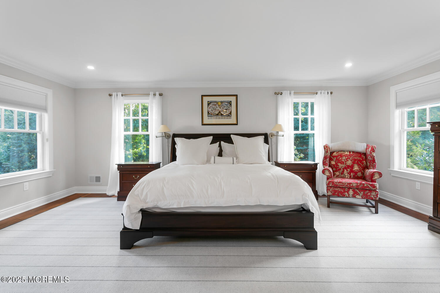 10 Edgewood Road Rumson, NJ 07760 - Photo 24 of 43 a spacious bedroom with a bed and wooden floor