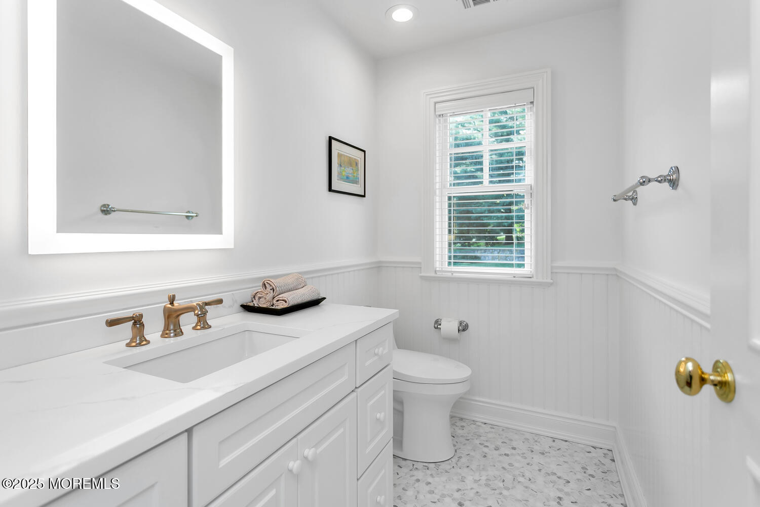 10 Edgewood Road Rumson, NJ 07760 - Photo 25 of 43 a bathroom with a sink toilet and window