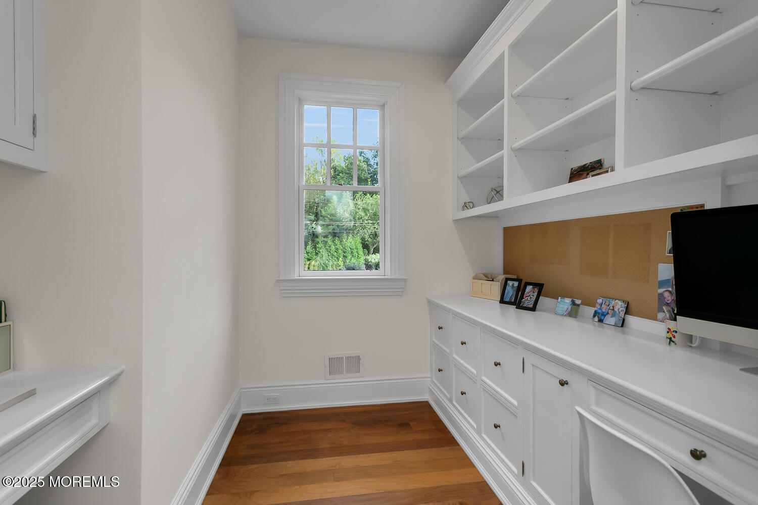 10 Edgewood Road Rumson, NJ 07760 - Photo 27 of 43 a bathroom with a double vanity sink and mirror