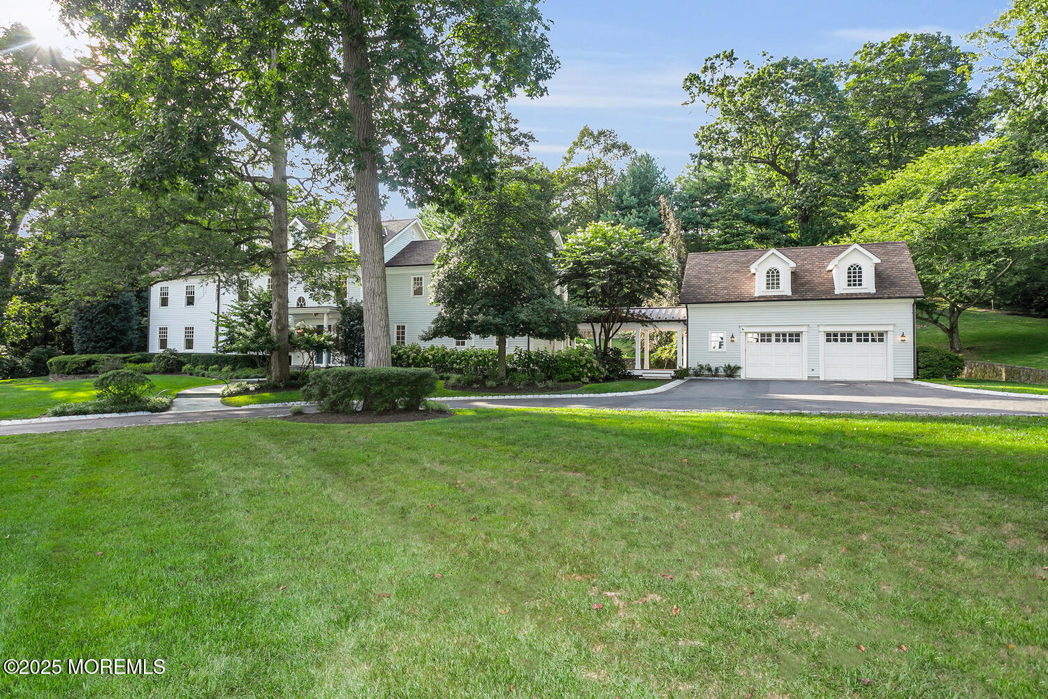 10 Edgewood Road Rumson, NJ 07760 - Photo 34 of 43 a front view of a house with a yard