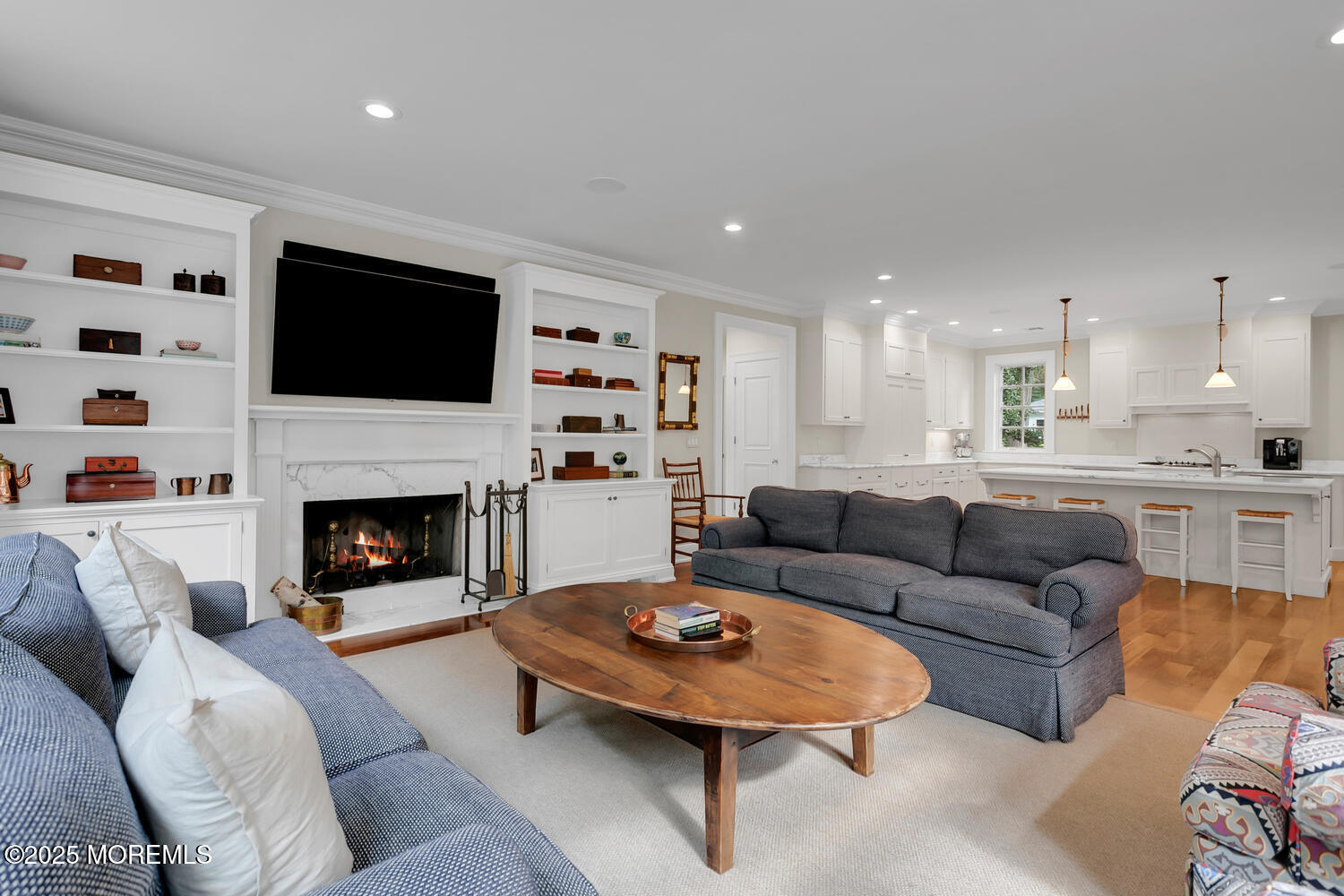 10 Edgewood Road Rumson, NJ 07760 - Photo 5 of 43 a living room with furniture fireplace and a flat screen tv
