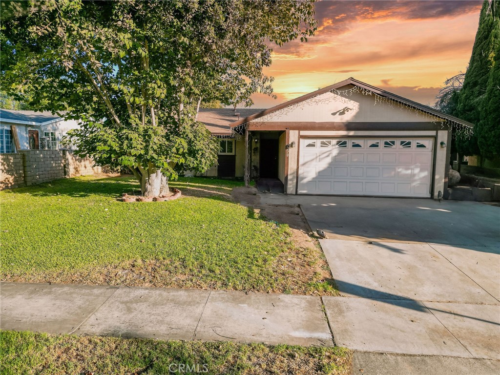 7270 Fiesta Avenue Riverside, CA 92504 - Photo 1 of 1 a front view of house with yard and green space