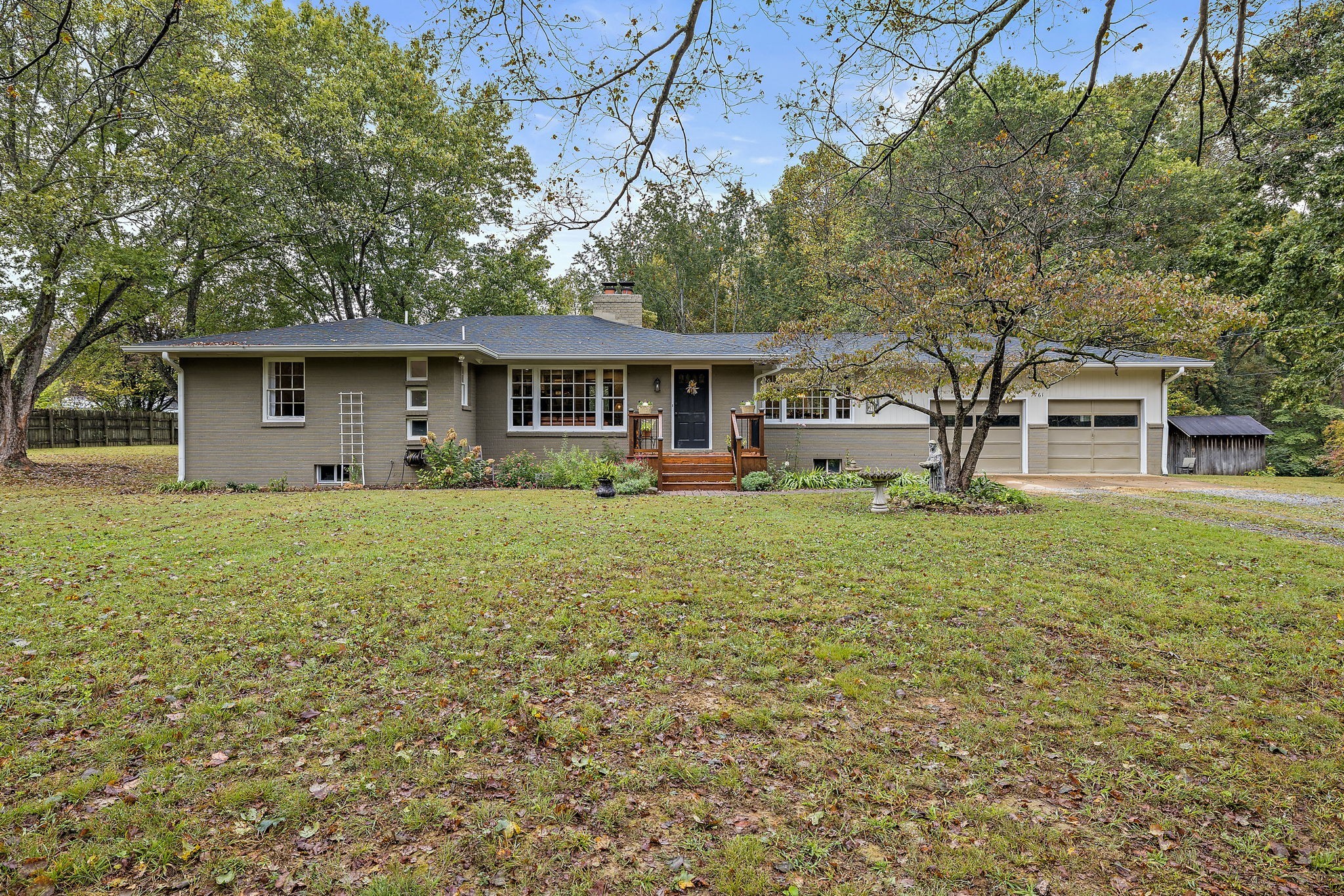 7767 Fernvale Road Fairview, TN 37062 - Photo 19 of 70 a front view of a house with garden