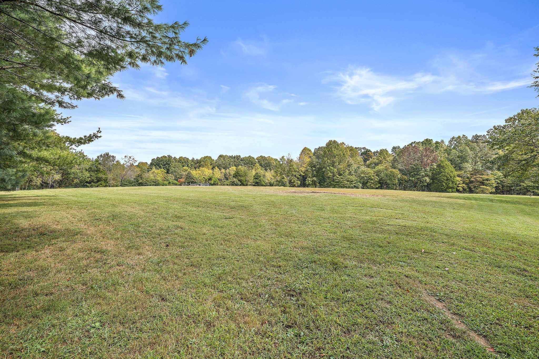 7767 Fernvale Road Fairview, TN 37062 - Photo 2 of 70 a view of a lake with houses in the back