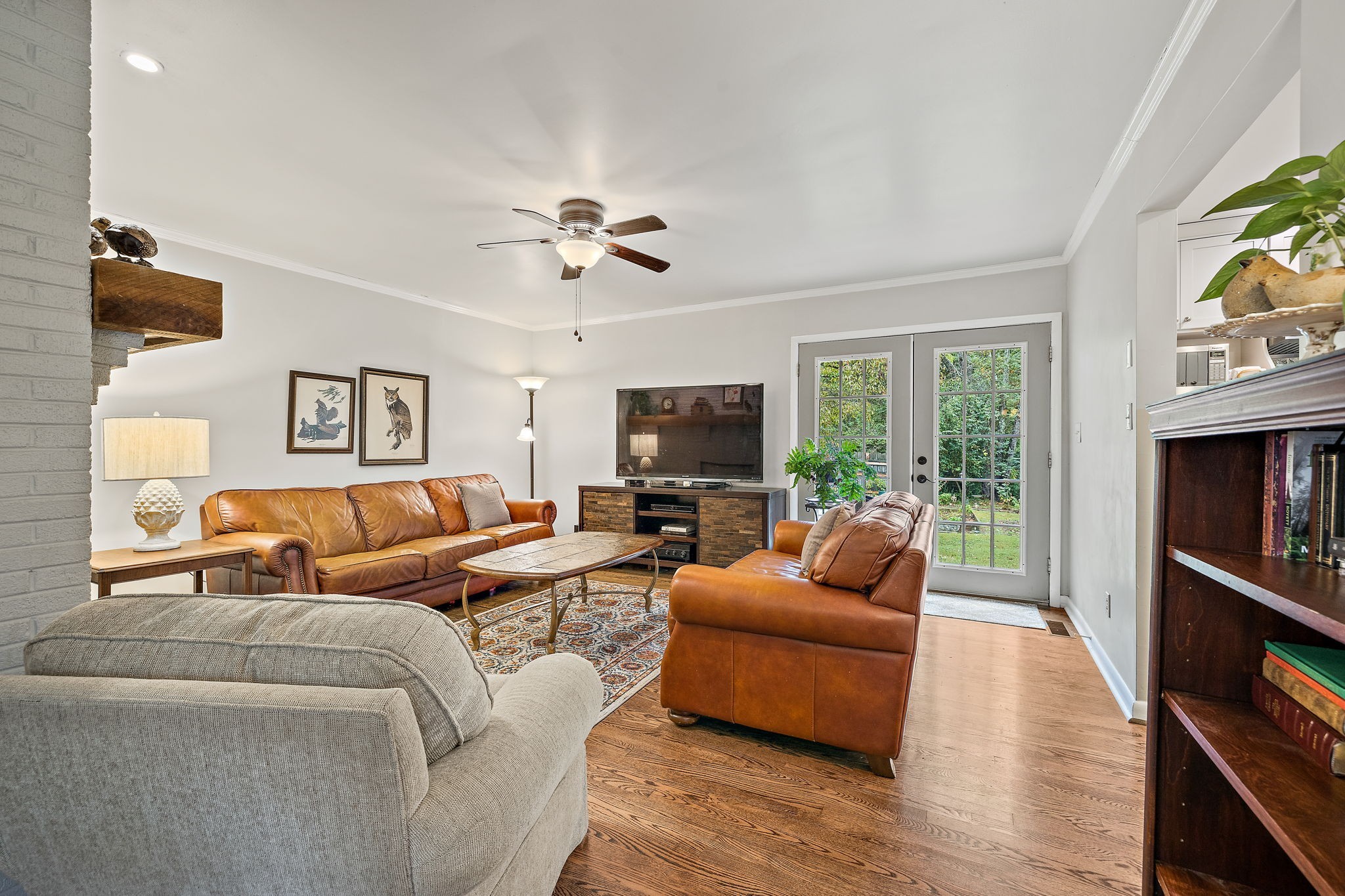 7767 Fernvale Road Fairview, TN 37062 - Photo 33 of 70 a living room with furniture and a flat screen tv