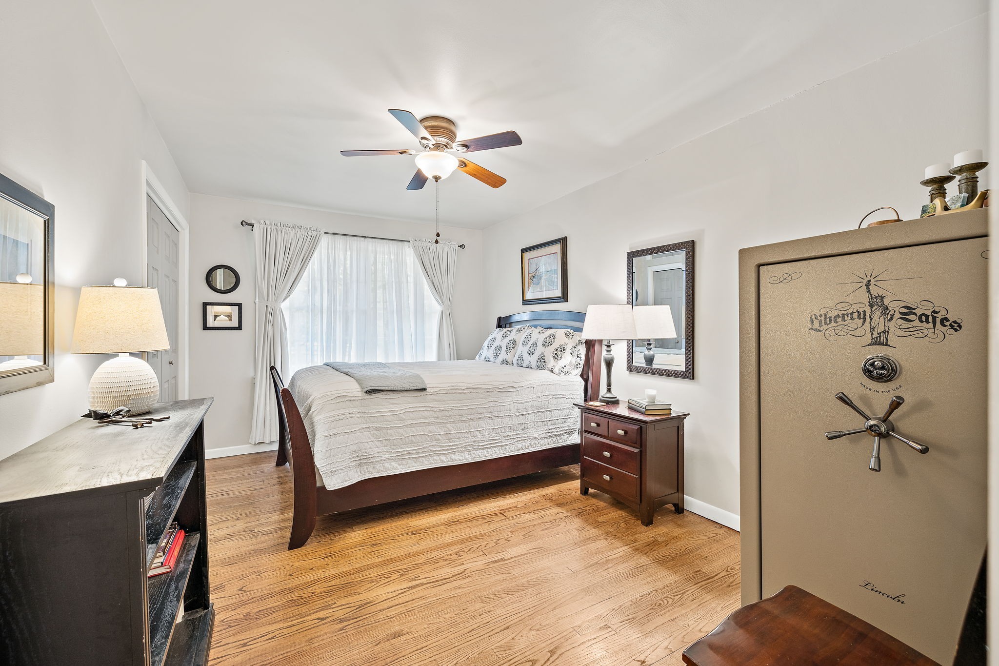 7767 Fernvale Road Fairview, TN 37062 - Photo 40 of 70 a bedroom with a bed and wooden floor