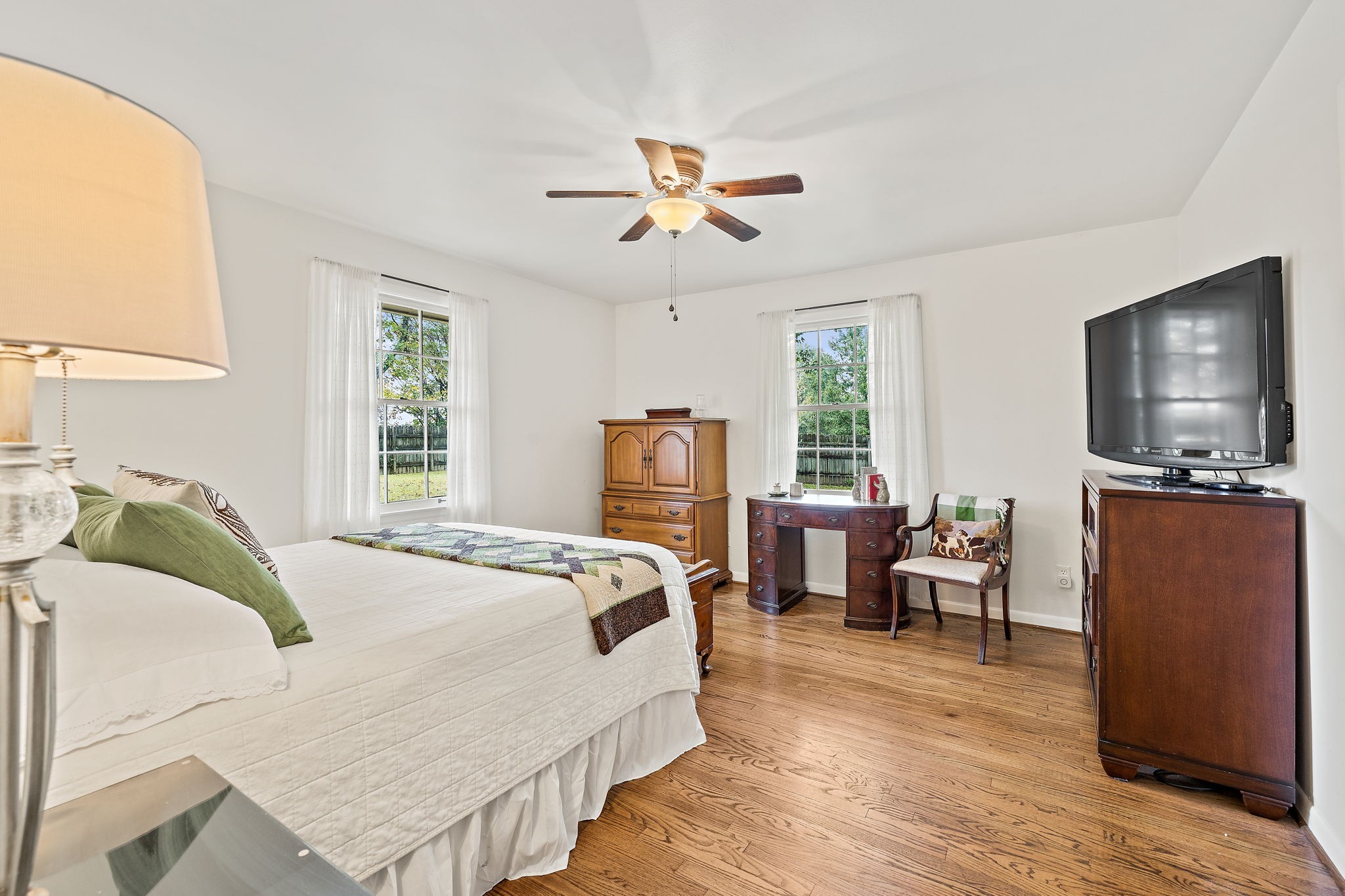 7767 Fernvale Road Fairview, TN 37062 - Photo 41 of 70 a bedroom with a bed and a flat screen tv