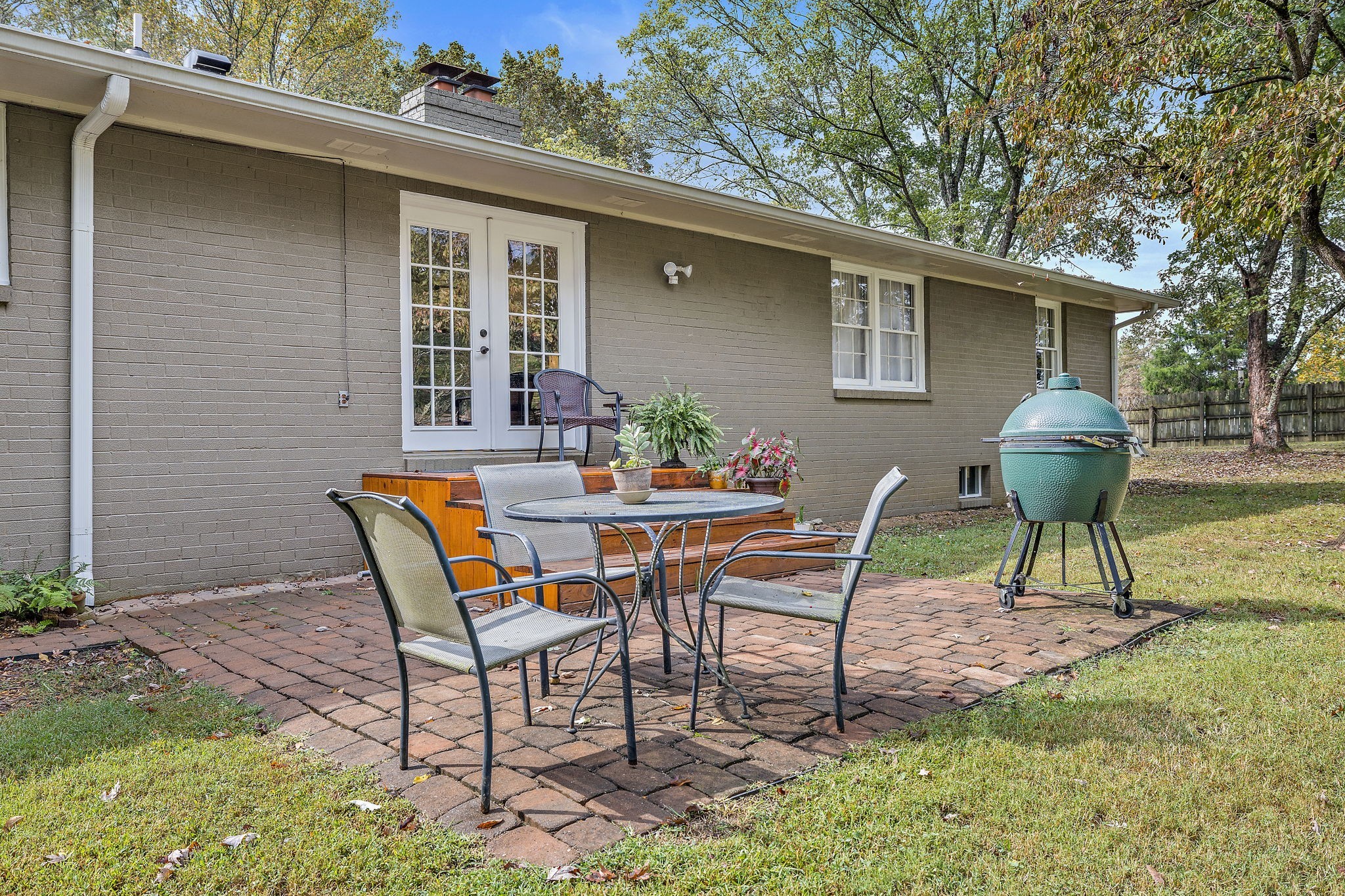 7767 Fernvale Road Fairview, TN 37062 - Photo 42 of 70 a view of a backyard with table and chairs