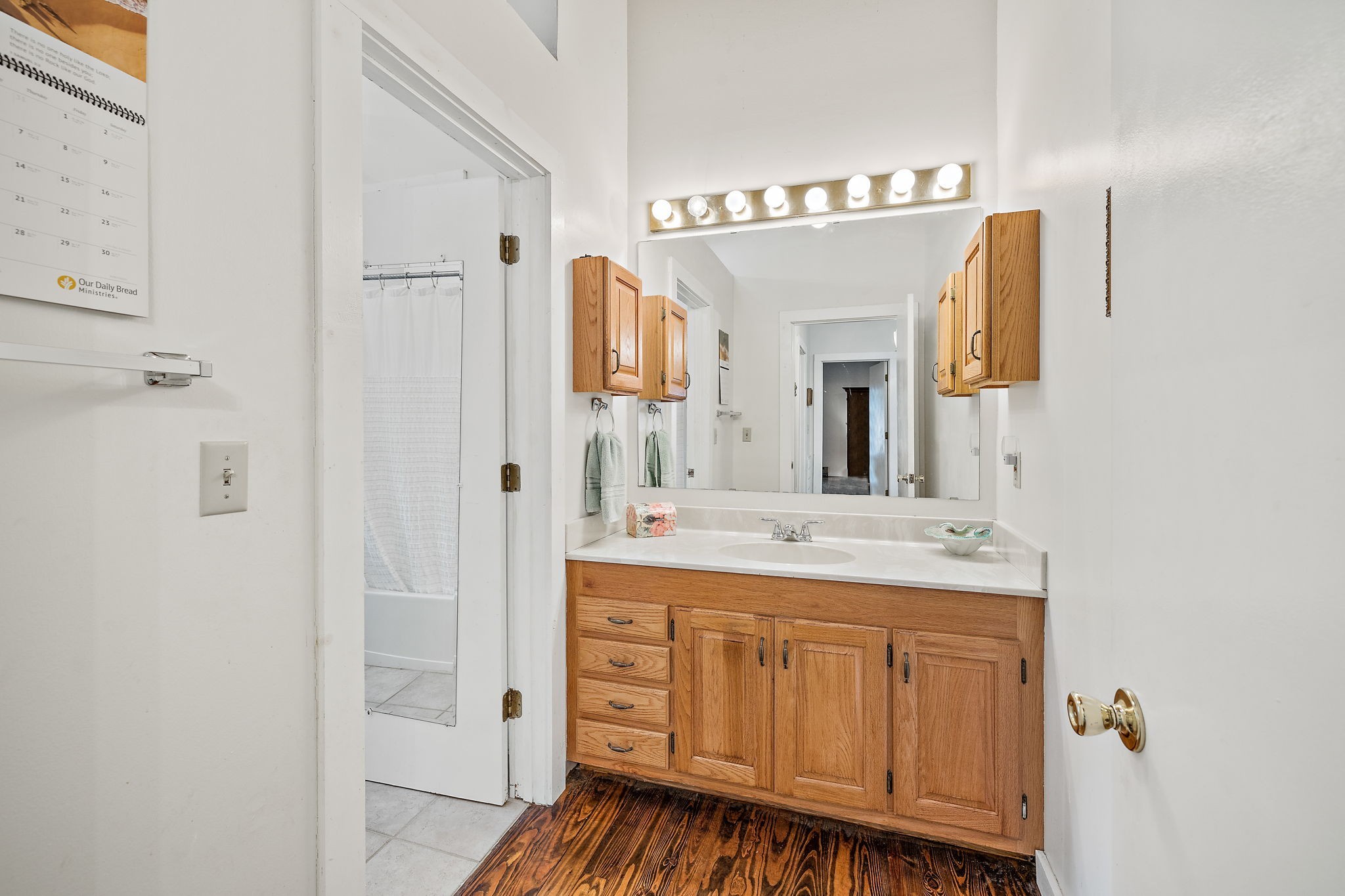 7767 Fernvale Road Fairview, TN 37062 - Photo 54 of 70 a bathroom with a granite countertop sink vanity and a mirror