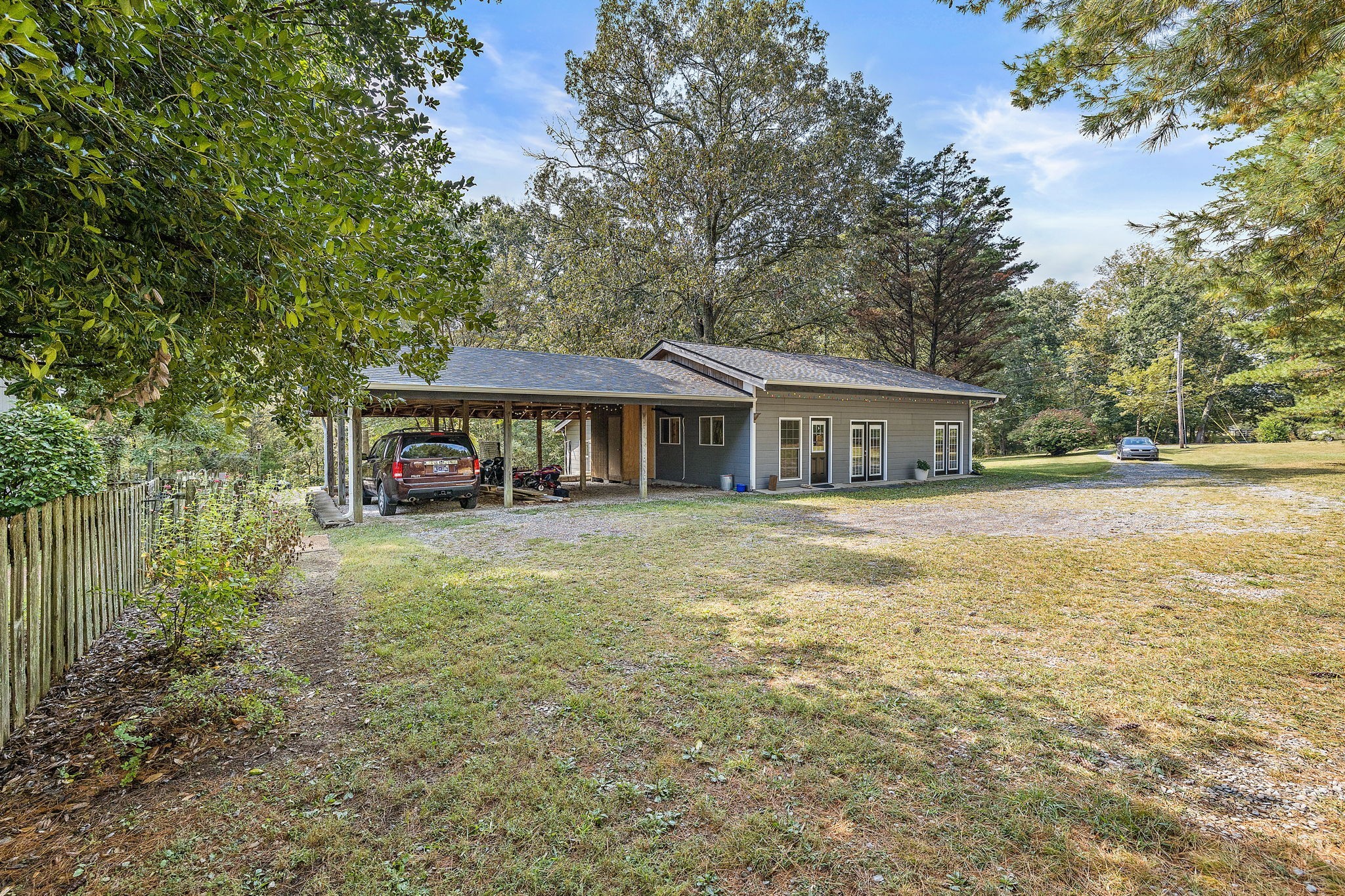 7767 Fernvale Road Fairview, TN 37062 - Photo 63 of 70 a front view of a house with a garden
