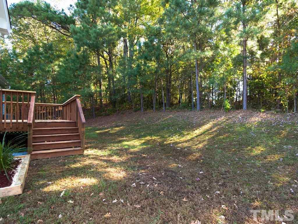 833 Shackleton Road Apex, NC 27502 - Photo 15 of 16 Wooded, Private Backyard with Mature Trees Providing Great Shade in Summer!