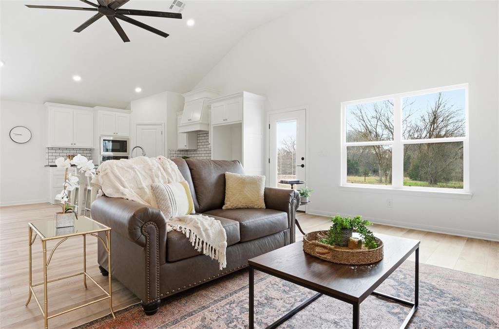 2303 Pilgrim Lane Lorena, TX 76655 - Photo 5 of 38 a living room with furniture and a window
