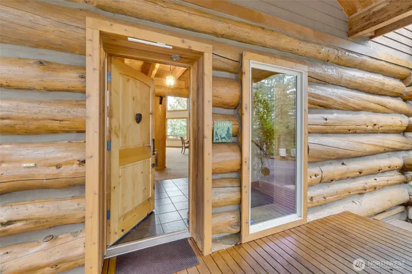 a view of a bathroom from a door